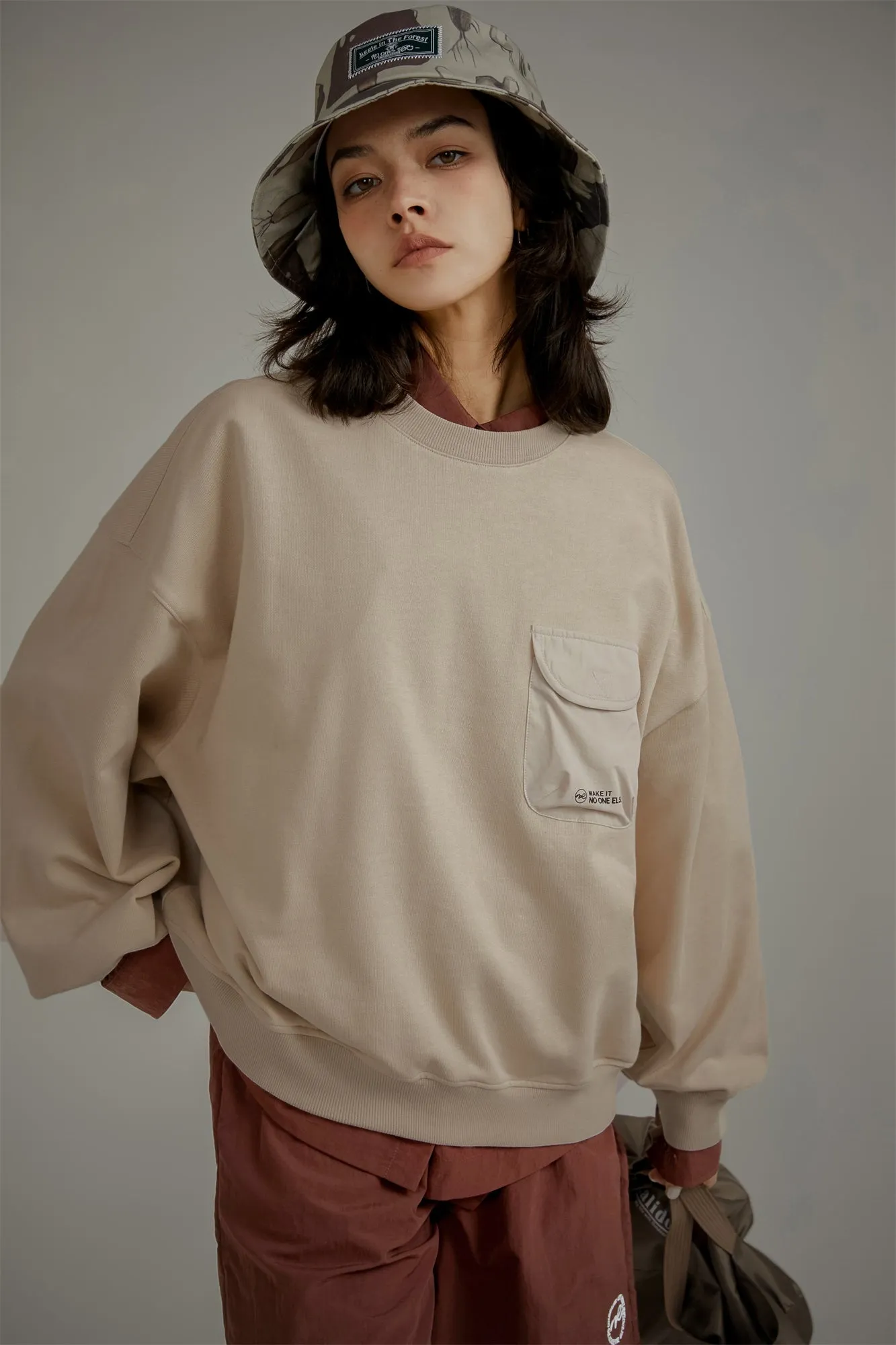 Pocket Loose Fit Sweatshirt